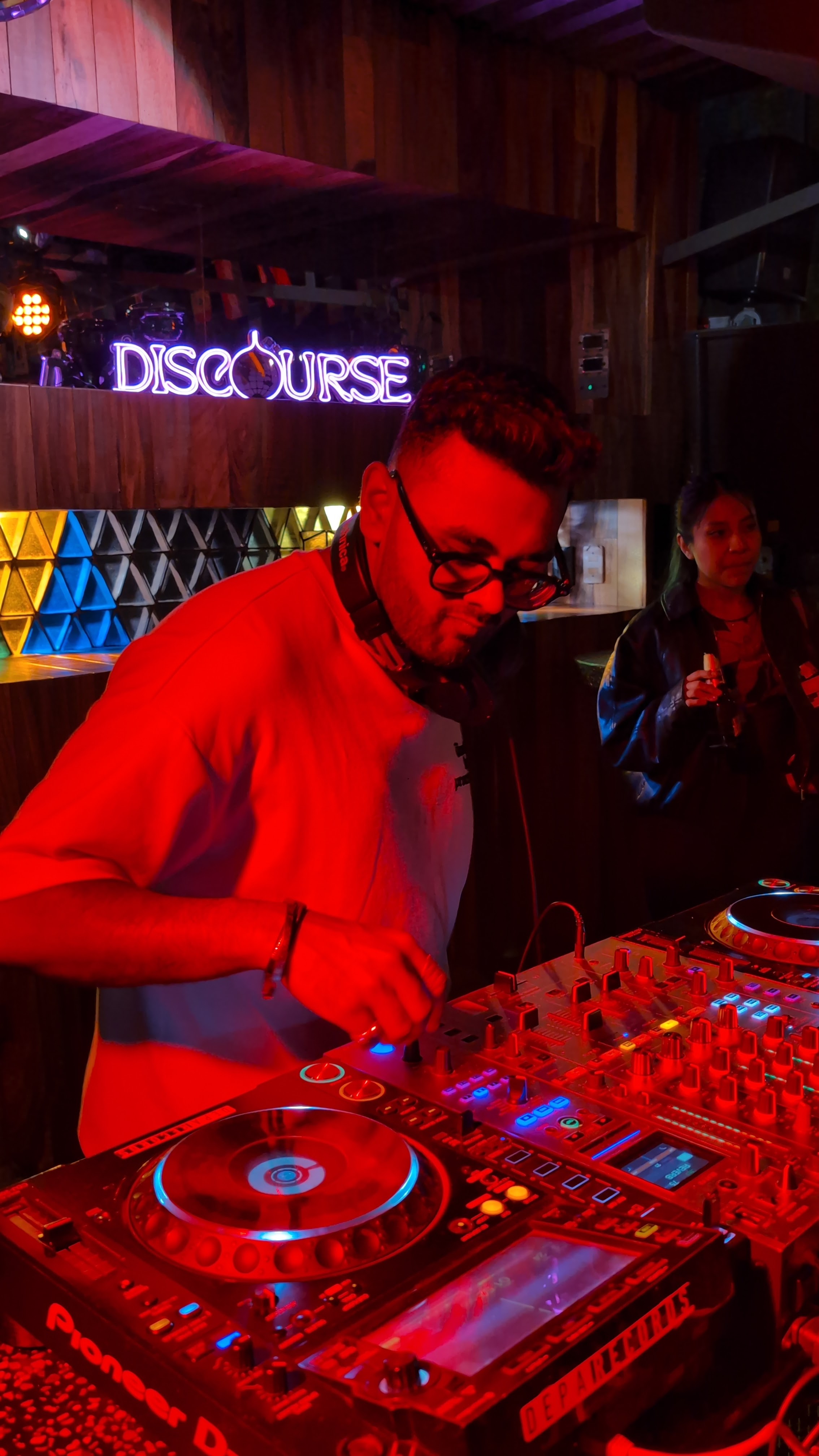 SVAID MUSIC DJing at the decks